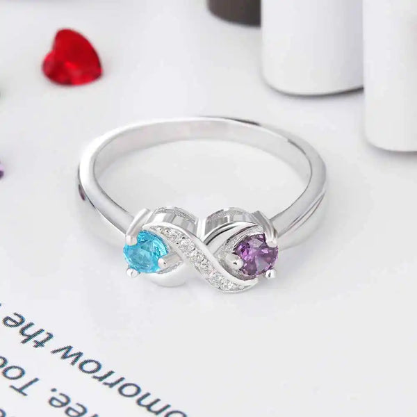 925 Sterling Silver Infinity Mothers Ring with a round birthstone engraved with the couple's name